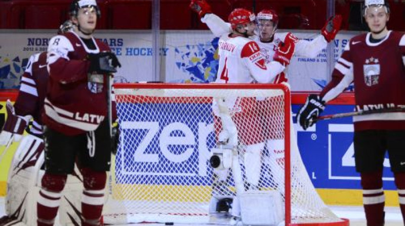 Dānijas hokejisti svin uzvaras vārtus
Foto: AFP/Scanpix