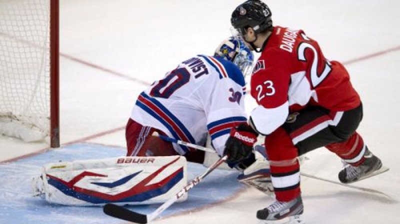 Kaspars Daugaviņš pārspēj Henriku Lundkvistu
Foto:AP/Scanpix