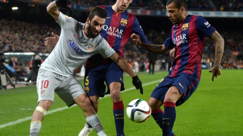 Arda Turans, Serhio Busketss un Dani Alvešs
Foto: AP/Scanpix