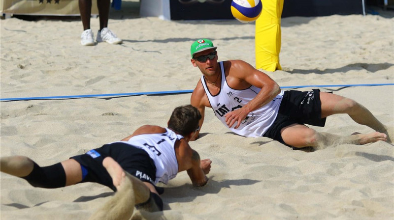 Mārtiņš Pļaviņš un Edgars Točs 
Foto: FIVB