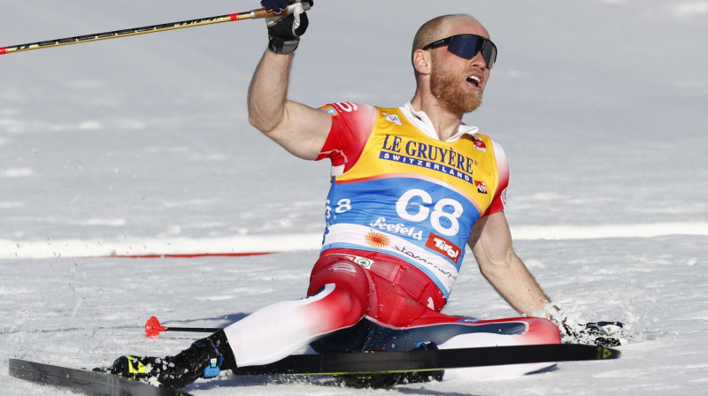 Martins Junsruds Sunbī finišē pasaules čempionāta 15 kilometru distancē. Foto: AP/Scanpix