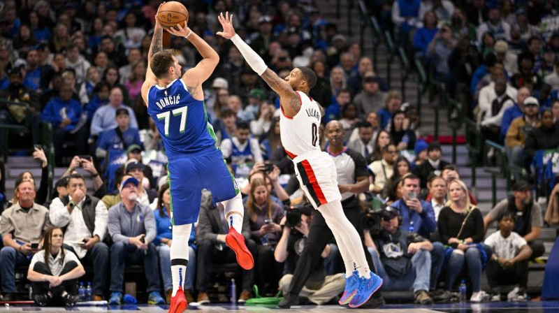 Luka Dončičs un Deimiens Lilards. Foto. USA Sports Today.Scanpix