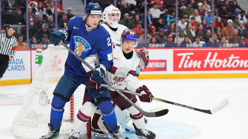 Soms un latvietis pie Linarda Feldberga vārtiem. Foto: IIHF