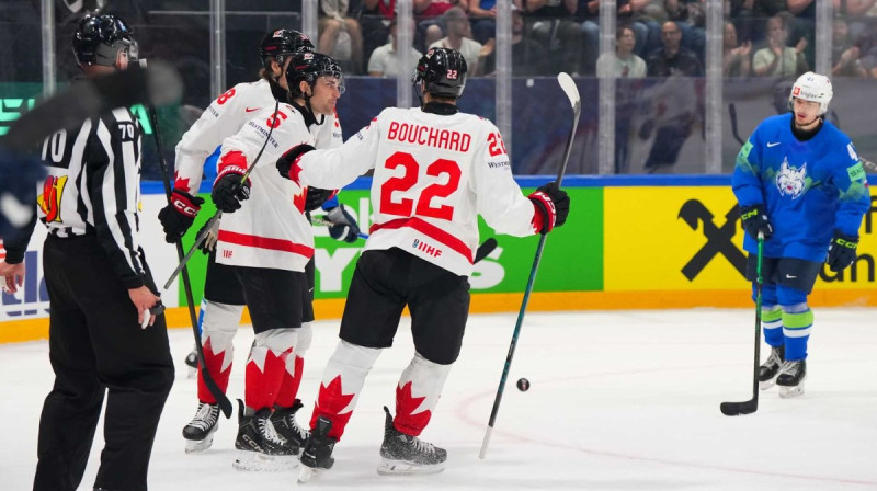 Kanāda vārtu guvumā. Foto: IIHF